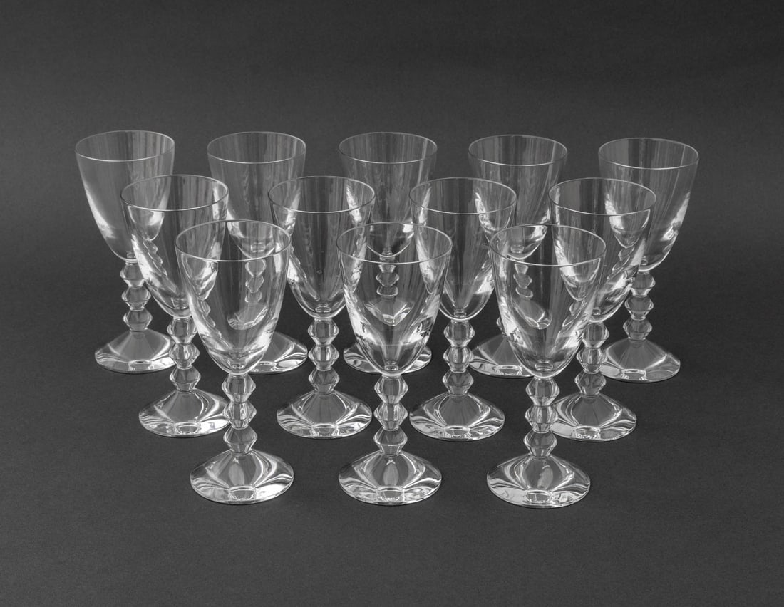 Baccarat "Vega" Crystal Port Wine Glasses, 12: Set of 12 Baccarat "Vega" Crystal Port Wine Glasses, acid-etched marks to the undersides, with one original box. 7" H x 3" Diameter. Provenance: From a Long Island Estate. Keywords: French cristal, Lu