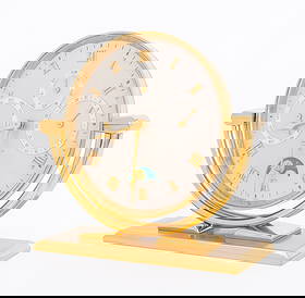 Tiffany & Co. Brass Calendar Moonphase Desk Clock: Tiffany and Company Brass Calendar Moon Phase Articulated Desk Clock, with silver-tone clock face, marked "Tiffany & Co. / 15 Jewels / 8", mounted on rectangular base, marked "Swiss" to underside. 6"