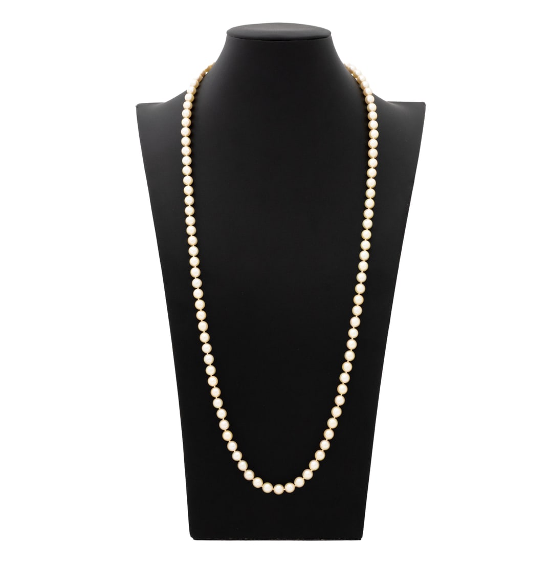 14K White Gold Diamond Cultured Pearl Necklace: 14K White Gold Diamond Cultured Pearl Necklace, featuring fully drilled cultured round pearls approx. 7.0 7.75 mm, strung on silk cord, knotted between each pearl, joined with white gold box and tongu