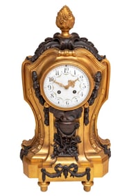 Louis XVI Style Gilt and Patinated Bronze Clock
