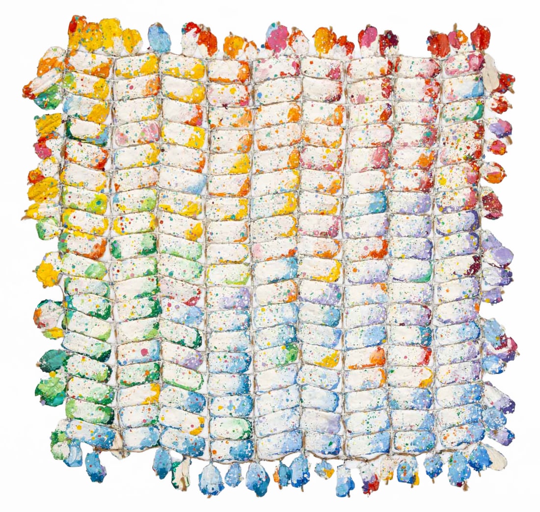 Elfi Schuselka Rainbow Grid Sculpture, 1981: Elfi Schuselka (Austrian, b. 1940), Rainbow Grid, Dried Paint and Twine Sculpture, 1981, signed and dated verso. 31" H x 30.5" W. Provenance: From the collection of the artist. Note: Schuselka studied