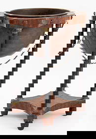 Empire Revival Wood Jardiniere Stand: Empire Revival Wood Jardiniere Stand, with metal insert and chain elements. 19.25" H x 12.5" Diameter. Provenance: From a New York City Collection. Keywords: Grand Tour style, Neoclassical style, Vess