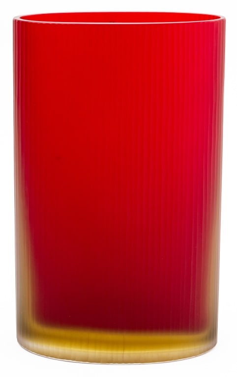 Murano Venini "Ellittici" Art Glass Vase, 2000: Murano Venini "Ellittici" Art Glass Vase, 2000, in red and yellow, titled and dated "Ellittici / 2000" to underside and "Made in Italy / Venini Murano" label to the top rim. 11.75" H x 7.25" W x 3.75"
