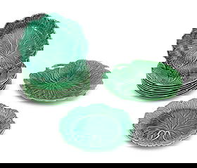 Wedgwood Cabbage Leaf Majolica Service, 11 Pcs.: Wedgwood Cabbage Leaf Green Glazed Majolica Assembled Service, comprising: a handled shallow bowl with impressed "Wedgwood / BMI / M" marks to underside, two Wedgwood of Etruria & Barlaston foliate fo