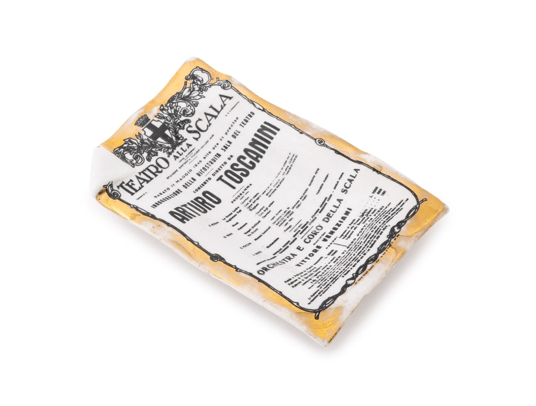 Fornasetti "Toscanini's Concert" Porcelain Tray: Fornasetti "Toscanini's Concert" Porcelain Tray, with gilt edge, marked "Fornasetti Milano / Made in Italy" to the underside. 1" H x 8.5" W x 5.25" D. Provenance: From a Long Island Estate. Keywords: