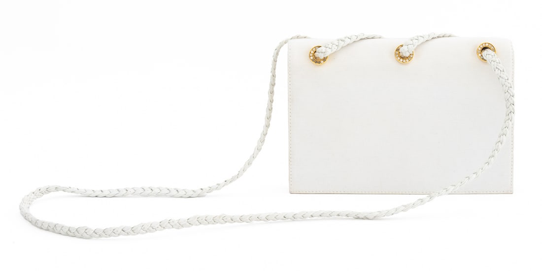 Valentino Garavani "Night" Handbag: Valentino Garavani White Synthetic Blend "Night" Handbag, with braided leather shoulder strap, gold-tone rhinestone encrusted hardware, magnetic front clasp opening to red lining with single zipper po