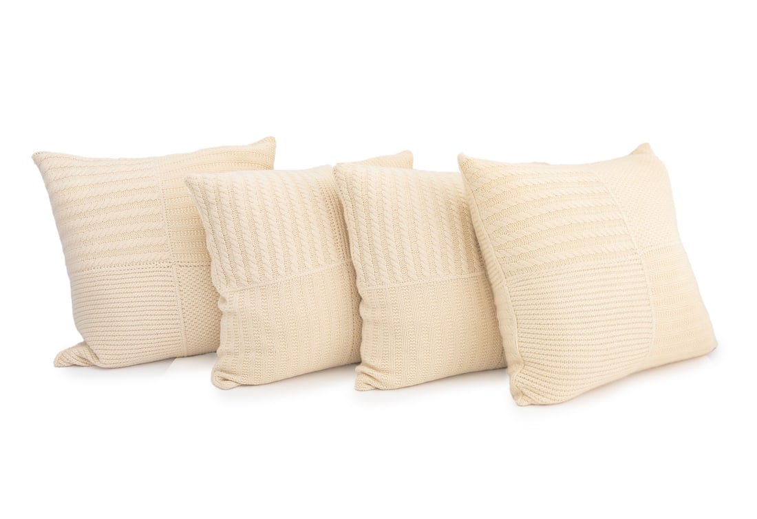 Ralph Lauren Cable-Knit Cashmere Pillows, 4: Set of Four Ralph Lauren White Cable-Knit Cashmere Cushions, labels present. 26" H x 25.5" W x 7" D. Provenance: From a Long Island Estate. Keywords: Cushions, Designer, American design, Sweater knit,