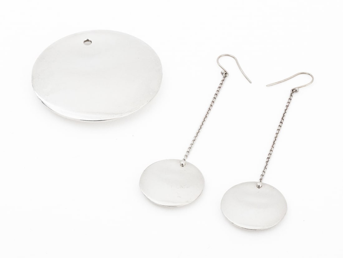 Elsa Peretti for Tiffany & Co. Sterling Jewelry, 3: Elsa Peretti for Tiffany and Company Three-Piece Sterling Silver Jewelry Set, comprising: circular pendant and pair of circle drop earrings, each marked "Tiffany & Co. / Elsa Peretti / 925 Spain". Wei