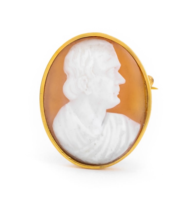 14K Yellow Gold Carved Shell Cameo Pin: 14K Yellow Gold Framed Carved Shell Cameo Brooch, worn through fabric with pinstem, joint and catch. Gold tested. Measuring approx. 1 1/4" x 1", 4.4 dwt. Provenance: From a 201 West 89th Street Collec