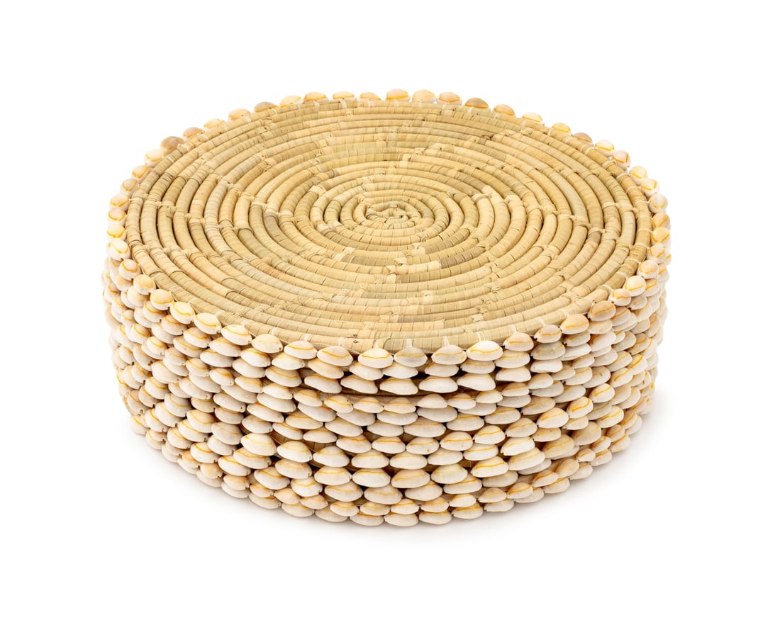 Cowrie Shell Mounted Placemats, 12: Set of 12 Cowrie Shell Mounted Circular Placemats. 14.5" Diameter x 0.5" H. Provenance: From a Long Island Estate. Keywords: Tableware, Place setting, Tablescape, Shells, Marine motif, Hosting, Servic