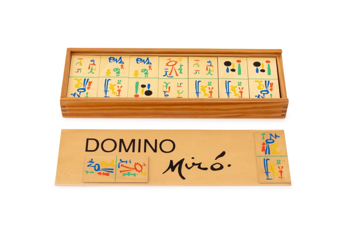Joan Miro "Parleur Seuil" Domino Game Set: Joan Miro "Parleur Seuil" Domino Game Set, 1958, with 28 printed wood tiles and wood game case. 1.75" H x 14.75" H x 4.75" D. Provenance: From a Long Island Estate. Keywords: Vintage Games, Table game