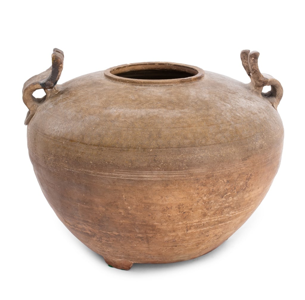 Chinese Han Dynasty Stoneware Storage Vessel: Chinese Han Dynasty Stoneware Storage Vessel, with two applied animal form handles. 10" H x 12.5" Diameter. Provenance: From the Upper East Side Apartment of a Former Ambassador. Keywords: Asian Art,