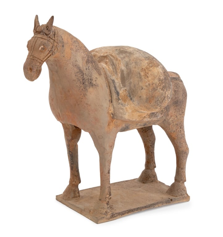 Chinese Tang Dynasty Style Terracotta Horse: Chinese Tang Dynasty Style Terracotta Horse Sculpture, holding a pack across its saddle, on rectangular terracotta base, with label to underside. 8" H x 9.5" W x 5.5" D. Provenance: From an East Villa