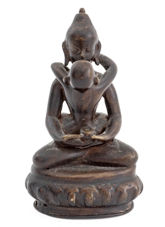 Tibetan Samantabhadra Bronze Sculpture: Tibetan Samantabhadra Bronze Sculpture, depicting two figures in a yab-yum embrace atop a lotus pedestal. 4.25" H x 2.5" W x 2.5" D. Provenance: From the Upper East Side Apartment of a Former Ambassad