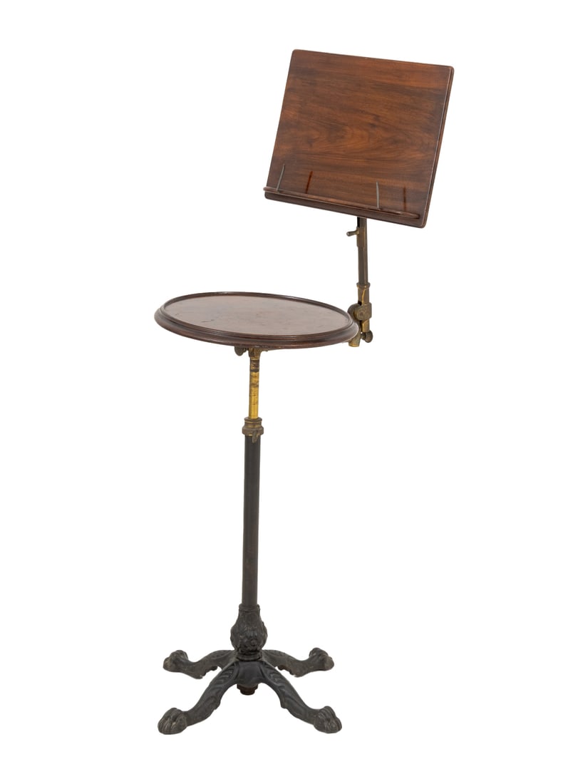Leveson & Son's Mahogany Adjustable Music Stand: Leveson and Son's Mahogany Adjustable Music Stand, in the style of John Carter, with sheet music or book holder having brass adjustable mechanism, circular seat mounted on iron paw foot base, marked "