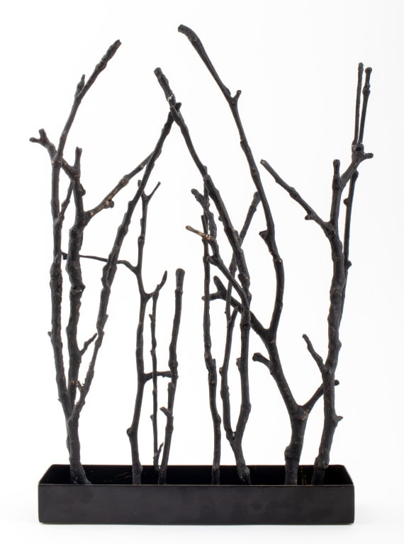 Magnolia Branch Patinated Brass Sculpture: Magnolia Branch Patinated Brass Sculpture, depicting twigs on a black metal base, apparently unsigned. 15.5" H x .5" W x 3" D. Provenance: From an Upper East Side Collection. Keywords: Statue, Metalwo