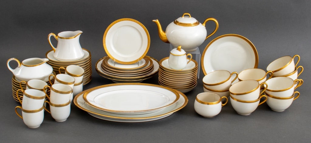 Limoges Porcelain Assembled Partial Service: Limoges Porcelain Assembled Partial Service, with gilt rims and comprising: (12) twelve tea cups, (12) twelve saucers, (10) ten coffee cups, (10) ten saucers, (1) one tea pot with lid, (2) two creamer