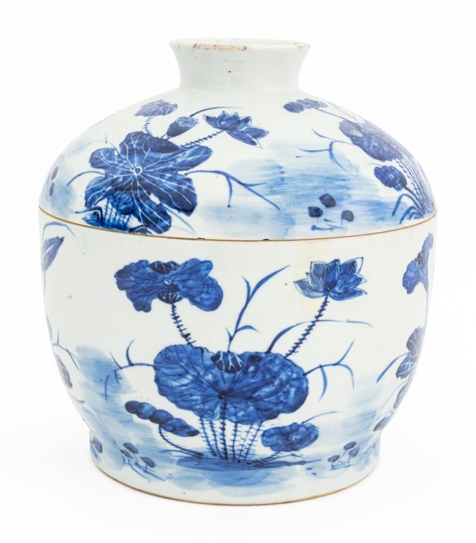 Chinese Blue & White Porcelain Covered Jar: Chinese Blue and White Porcelain Covered Jar, hand-painted with lotus flower motif. 10.5" H x 9.75" Diameter. Provenance: Property from the residence of the MacArthur family. Keywords: Asian Art, Chin