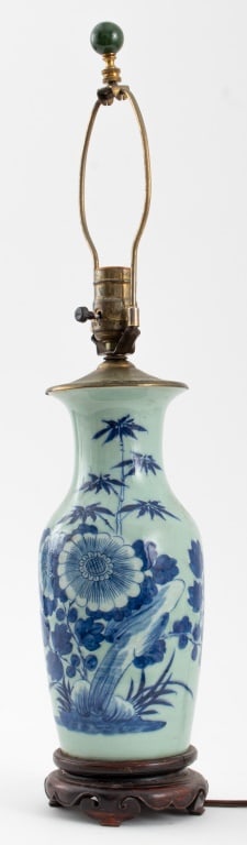 Chinese Blue & White Porcelain Vase Mounted Lamp: Chinese Blue and White Porcelain Vase Mounted as a Lamp, with floral motif, mounted on carved wood base, 23.75" H x 5.5" Diameter. Provenance: From a New York City Collection. Keywords: Chinese cerami