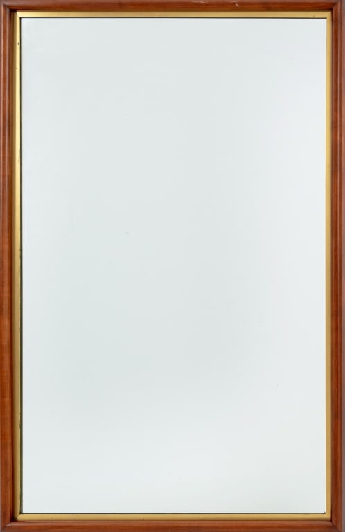 Modern Mahogany Wall Mirror: Modern Mahogany Wall Mirror, 20th century, with brass interior border. Mirror plate: 46.25" H x 28.5" W; frame: 50.5" H x 32.5" W x 2.5" D. Provenance: From a New York City Collection. Keywords: Looki