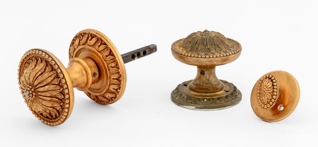 Sherle Wagner Gilt Brass Pulls, 3: Collection of Three Sherle Wagner Gilt Brass Pulls, from the Heritage collection, comprising: a door knob, one drawer pull, and one back plate, one marked "Made in France 1335" to the reverse. 5.75" L