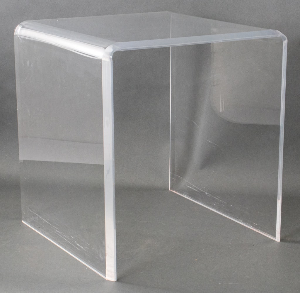 Modern Clear Acrylic Waterfall Table: Modern Clear Acrylic Waterfall Table, in the manner of Charles Hollis Jones. 17" H x 16" W x 16" D. Provenance: From a New York City Collection. Keywords: Vintage Furniture, Modern design, Retro, End