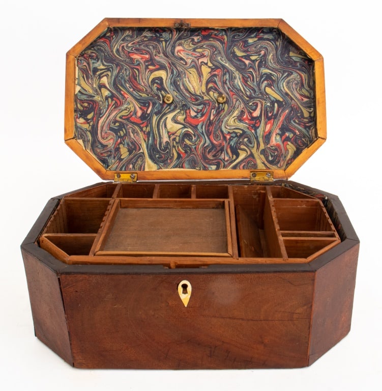 English Mahogany Octagonal Jewelry Box, ca. 1900: English Mahogany Octagonal Jewelry Box, circa 1900, with divided interior and brass handle to top. 5.25" H x 12" W x 7.5" D. Provenance: From a New York City collection. Keywords: Vessel, Container, A