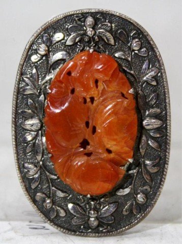 Chinese Silver and Carnelian Brooch: Silver and carnelian brooch with floral and insect motif, China; marked. Dimensions: 2-1/4" H x 1-1/2" L