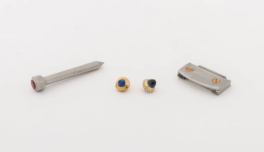 Cartier Loose Watch Parts, 4: Collection of Four Cartier Loose Watch Parts, comprising: 18K yellow gold and sapphire crown, tanzanite and gold-tone crown, ruby and stainless steel crown, and two-tone Cartier santos link. Link: 7mm