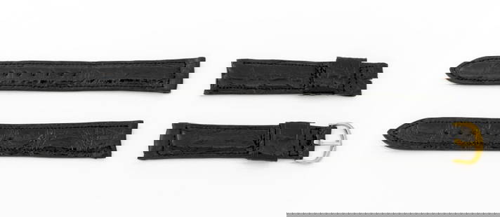 Omega Vintage Black Alligator Watch Straps, 2: Two Omega Vintage Black Alligator Leather Watch Straps, one having gold-tone buckle, marked "Omega", both marked "Genuine Alligator / 11 / 16". Longest piece: 17mm x 113mm. Provenance: From a Manhatta