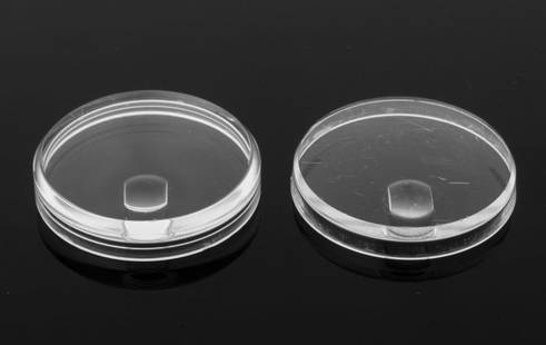 Rolex Genuine Crystals, 2: Two Rolex Genuine Crystals, comprising: no. 116 for reference no. 1655 and no. 127 for reference no. 1680, with original wax paper packaging. Each: 30mm Diameter. Provenance: From a Manhattan