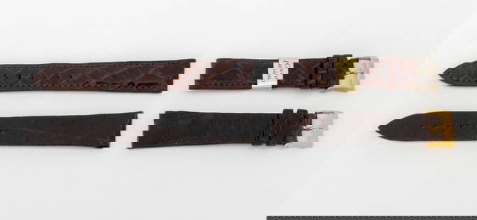 Rolex Crocodile Watch Straps, 2 Pcs.: Two Rolex Genuine Crocodile Skin Watch Straps, comprising: one in brown with silver-tone buckle and one in burgundy with gold-tone buckle, each marked "Rolex / Genuine Crocodile". Each approx: 19mm x