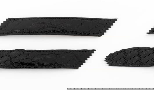 Cartier Black Crocodile Watch Strap: Cartier Crocodile Loose Watch Strap, in black for a deployment buckle, marked "Cartier/ Crocodile". Longest piece: 15mm x 114mm. Provenance: From a Manhattan Collection. Keywords: Watch parts, Time