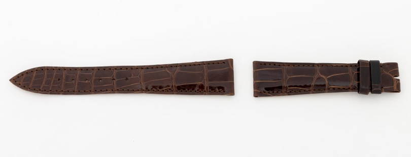 Patek Philippe Brown Alligator Watch Strap: Patek Philippe Brown Alligator Skin Loose Watch Strap, for deployant buckle, marked "Patek Philippe / Geneve". Longer piece: 20mm x 112mm. Provenance: From a Manhattan Collection. Keywords: Alligator