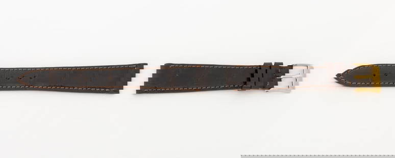 Patek Philippe Brown Crocodile Watch Strap: Patek Philippe Brown Crocodile Skin Loose Watch Strap, with gold-tone buckle, the strap marked "Patek Philippe / Geneve". Longest piece: 18mm x 112mm. Provenance: From a Manhattan Collection. Keywords