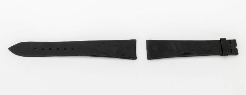 Patek Philippe Black Crocodile Watch Strap: Patek Philippe Black Crocodile Skin Loose Watch Strap, marked "Patek Philippe / Geneve". Longest piece: 18mm x 112mm. Provenance: From a Manhattan Collection. Keywords: Crocodile leather, Watch parts,