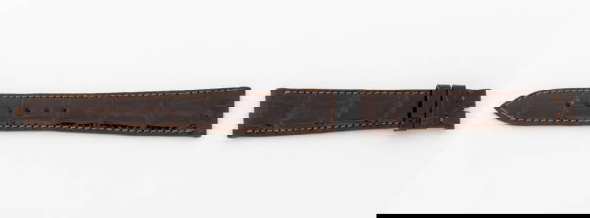 Patek Philippe Brown Crocodile Watch Strap: Patek Philippe Brown Crocodile Skin Loose Watch Strap, marked "Patek Philippe / Geneve". Longest piece: 18mm x 115mm. Provenance: From a Manhattan Collection. Keywords: Crocodile leather, Watch parts,