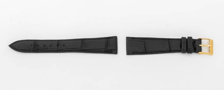 Patek Philippe Black Crocodile Watch Strap: Patek Philippe Black Crocodile Skin Loose Watch Strap, with gold-tone buckle, the strap marked "Patek Philippe / Geneve / Genuine Crocodile". Longest piece: 19mm x 109mm. Provenance: From a Manhattan