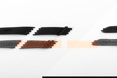 Breitling Loose Watch Straps, 2: Two Breitling Loose Watch Straps, comprising: brown crocodile, marked "Breitling / Croc Veritable", and black rubber, embossed "Breitling". Longest piece: 22mm x 129 mm. Provenance: From a Manhattan C