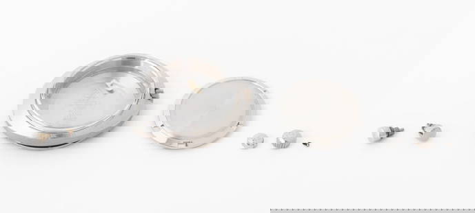 Omega Watch Parts, 7 Pcs.: Collection of Seven Omega Watch Parts, comprising: (1) one stainless steel case with crystal, marked "Omega / Watch Co. / Acier Inoxydable", (1) one stainless steel case back, marked "Acier