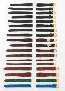 Open-End Crocodile Loose Watch Straps, 18: Collection of 18 Open-End Crocodile Skin Loose Watch Straps, comprising: (10) with silver-tone and gold-tone buckles in brown, black, green, and blue, all marked "deBeer" and (8) with gold-tone