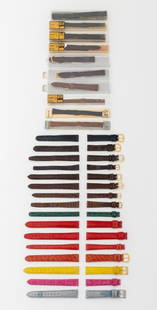 Lady's Lizard Skin Loose Watch Straps, 26: Collection of 26 Ladies Lizard Skin Loose Watch Straps, including: (3) three marked "Tiffany & Co.", (5) five marked "Hadley-Roma" with four in original box, and (2) Browning in original packaging.