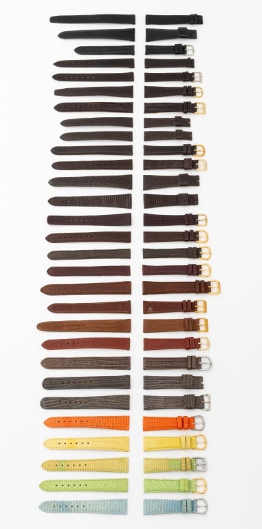 Lizard Skin Loose Watch Straps, 29: Collection of 29 Lizard Skin Loose Watch Straps, with silver-tone and gold-tone buckles, including: (11) marked "deBeer". Longest piece: 18mm x 120mm. Provenance: From a Manhattan Collection. Keywords