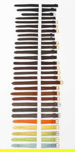 Lizard Skin Loose Watch Straps, 29: Collection of 29 Lizard Skin Loose Watch Straps, with silver-tone and gold-tone buckles, including: (11) marked "deBeer". Longest piece: 18mm x 120mm. Provenance: From a Manhattan Collection.