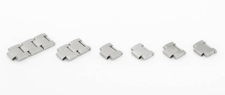 Rolex Solid Oyster Links for 19mm Bracelet, 9 Pcs: Collection of Nine Rolex Genuine Solid Oyster Stainless Steel Loose Links for 19mm Bracelet. Longest: 14mm x 32mm. Provenance: From a Manhattan Collection. Keywords: Jewelry, Jewellery, Watch,