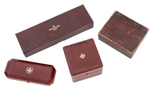 Patek Philippe, Etc. Watch Presentation Boxes, 4: Collection of Four Watch Presentation Boxes, comprising: three Patek Philippe burgundy leather with push button openings, one with original box and LeCoultre mahogany box with green velvet lining. Lar