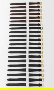 German Leather Clip-On Open End Watch Straps, 21: Collection of 21 German Leather Clip-On Open End Loose Watch Straps, comprising: (14) fourteen Di-Modell in black, each with gold-tone or silver-tone buckles, (6) six Di-Modell in brown with gold-tone