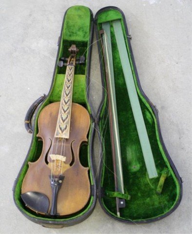 Antique Violin w/ Horse Hair Bow & Case: A violin decorated with leaf motif on neck, body, and back and six pointed star on body, complete with horse hair bow and green velvet lined case, Early twentieth century; marked "Made in Germany" on 