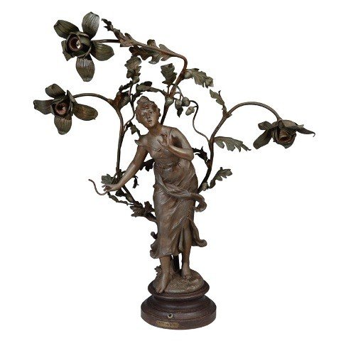 Antique Art Nouveau Lamp by Elsie Ward Hering: An antique figural white-metal Art Nouveau table lamp entitled "Muse des Bois" (Muse of the Woods), sculpture itself depicts a female figure in flowing drapery with three flowers surrounding her, bulb