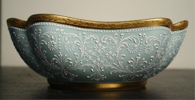Black Starr & Gorham Porcelain Bowl: Pale blue and gilt porcelain serving bowl with white enamel details, entirly hand painted, by G. Taller of Paris, Made in France, for Black Starr & Gorham; marked. Dimensions: 3-1/2"H x 9" square